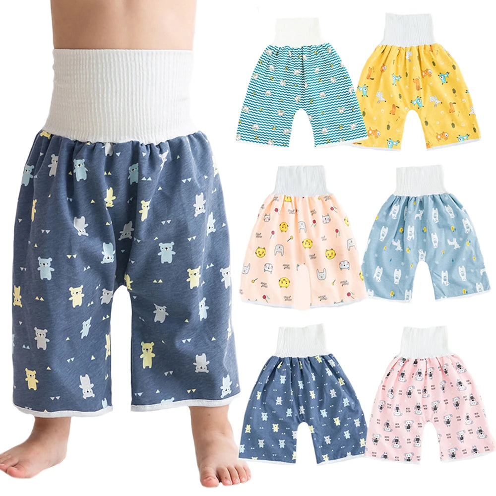 A collection of waterproof baby diaper pants with skirts in various patterns and colors for potty training.