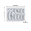 A white silicone mold set with multiple oval and circular cavities for making epoxy resin jewelry.