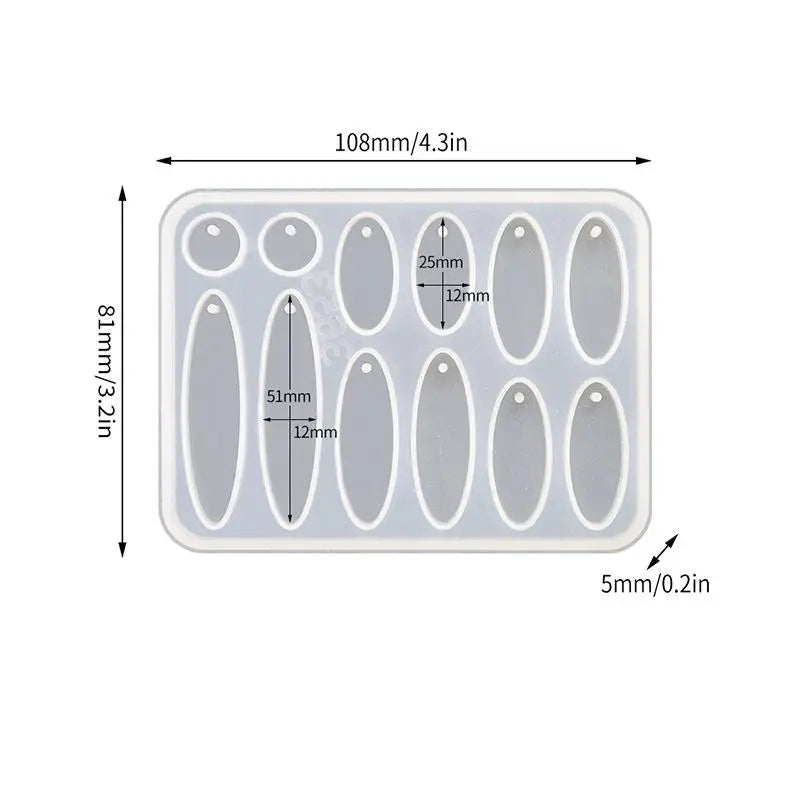 A white silicone mold set with multiple oval and circular cavities for making epoxy resin jewelry.