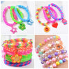 Assortment of glow-in-the-dark loom band bracelets and a colorful bracelet making kit for kids