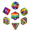 A set of silicone polyhedral dice, including a dodecahedron and a tetrahedron, with rainbow colored faces.