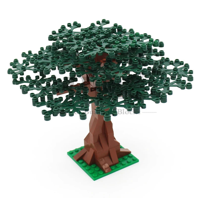 A model of a green cherry blossom tree built from interlocking plastic blocks on a green base.