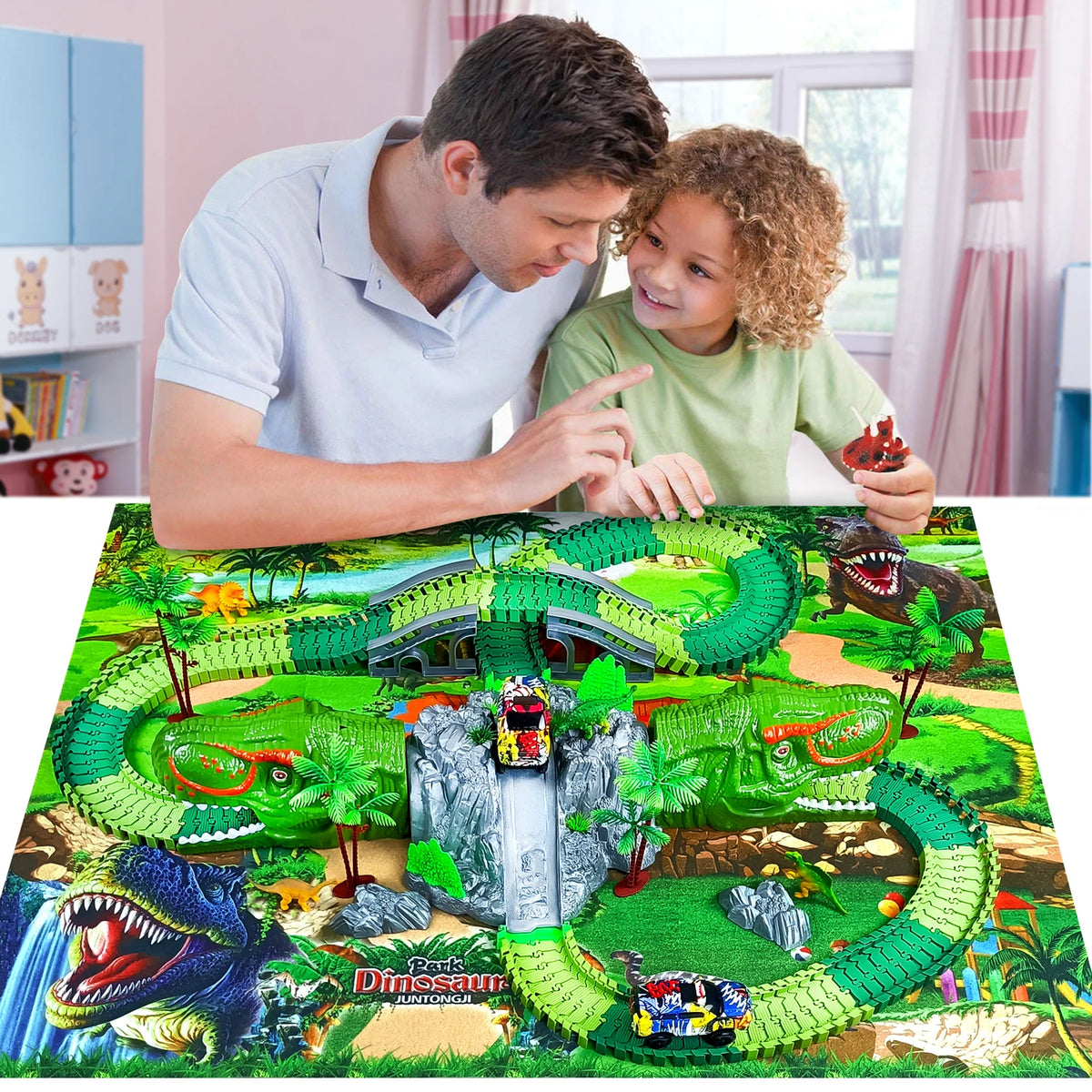 A boy is interacting with a green dinosaur race car track set featuring various dinosaurs and terrain.