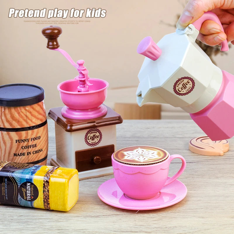 A pretend play tea party set featuring a coffee pot, cup, saucer, and cake for children.