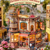A detailed wooden 3D puzzle model of the Dream Coffee Factory building.