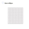 A grid of 100 small white cotton candle wicks with metal sustainers.