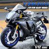 A silver and black Yamaha YZF-R1M alloy model diecast motorcycle in 1/12 scale.
