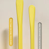 Two yellow crayons are shown, illustrating that the larger pen body offers greater durability than the thinner ones.