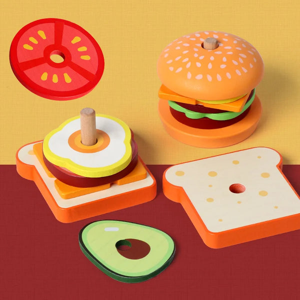A set of wooden toys featuring a burger, sliced bread, and an avocado, arranged on a reddish-brown surface.
