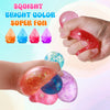 Hands are squeezing bright colored squishy stress balls, showing various colors like orange, blue, and pink.