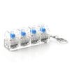 A clear plastic keychain featuring multiple illuminated keyboard key fidget toys with blue components.