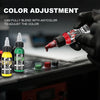 A hand adjusts a tattoo ink color, demonstrating the ability to fully blend with any color.