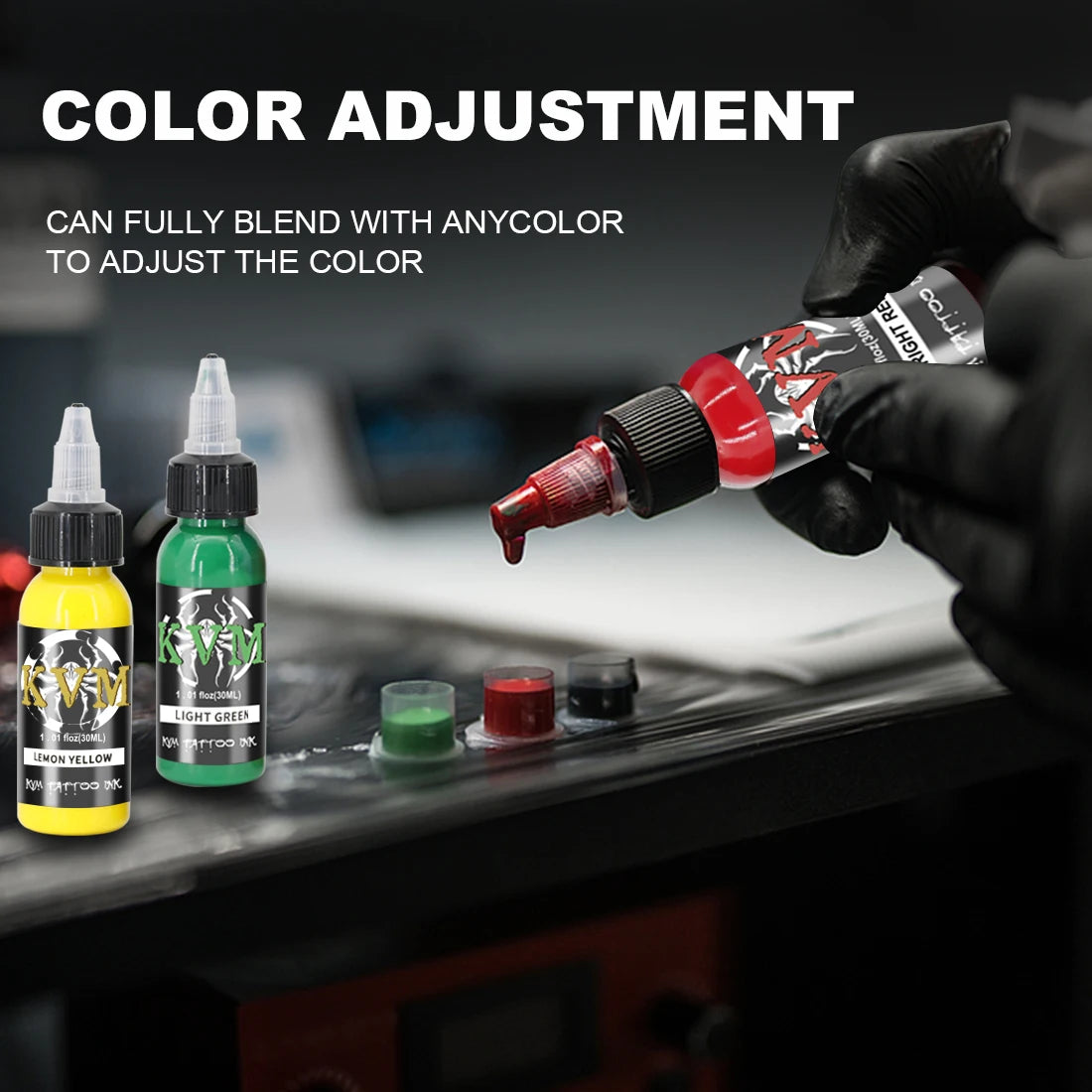 A hand adjusts a tattoo ink color, demonstrating the ability to fully blend with any color.