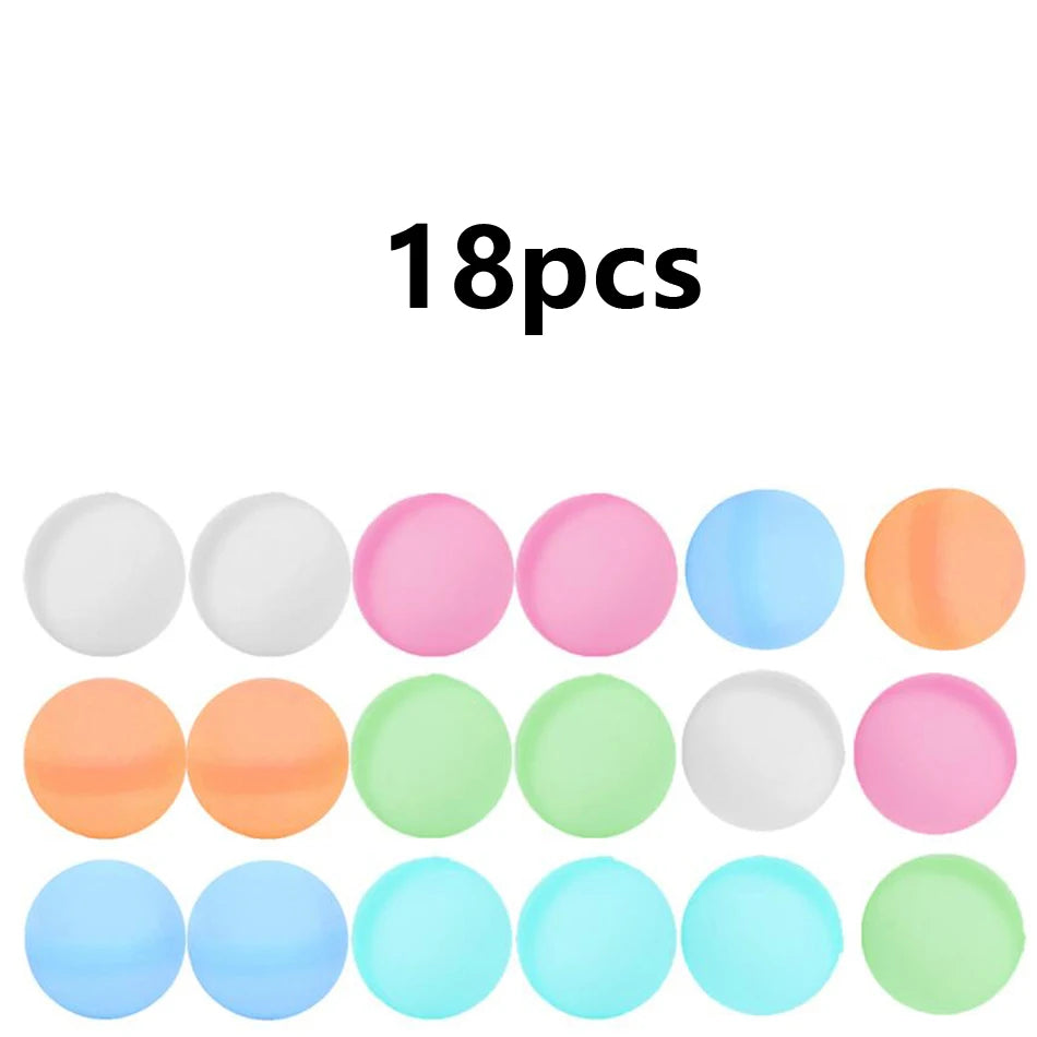 A collection of reusable quick-fill water balloons in various pastel colors including white, pink, blue, and orange.