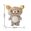 A soft gray Rilakkuma anime plush bear stuffed toy with yellow ears and a white chest.