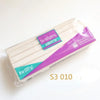 A plastic package of Sculpey III oven-bake clay in a purple and teal design.