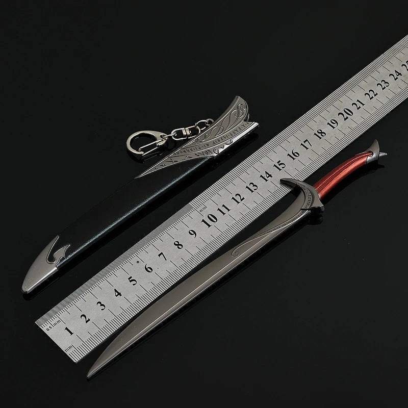 A replica Orcrist sword model next to a ruler showing its length.