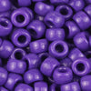 A close-up view of small purple pony beads for jewelry making and crafts.