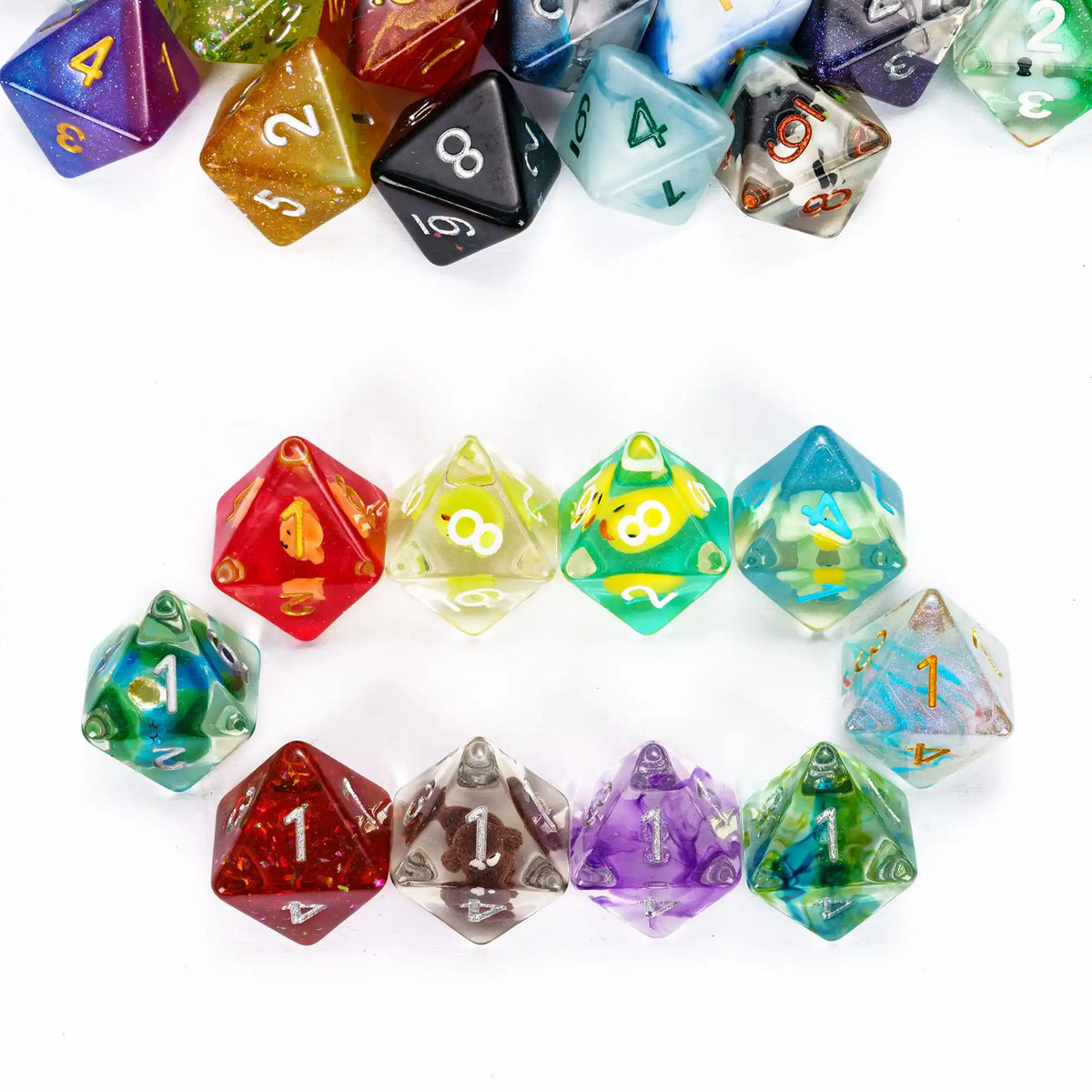 A collection of seven polyhedral resin dice in various colors and shapes arranged in a circle.