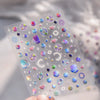 Clear stickers featuring colorful glitter and holographic designs for nail art