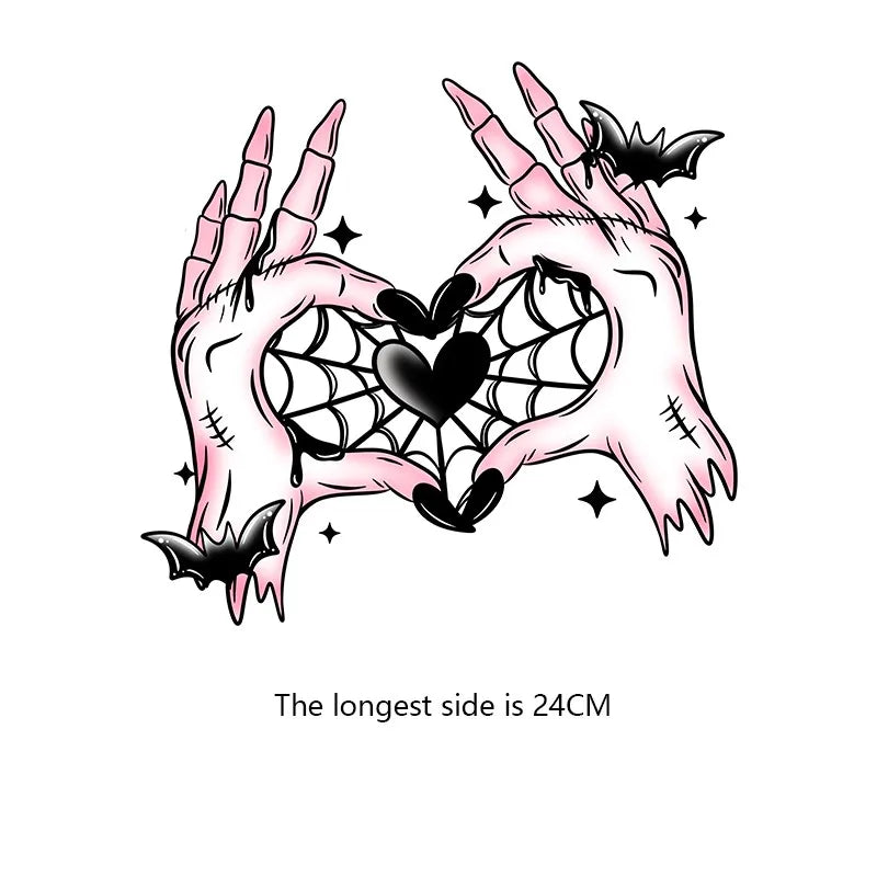 A hand print design featuring a heart shape and bat motifs, suitable for Halloween iron-on patches.