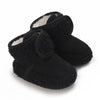A pair of black plush baby snow boots with faux fur trim and anti-slip soles.