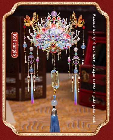 A detailed 3D metal phoenix crown model kit featuring colorful jewels and feathers, displayed on a red background.