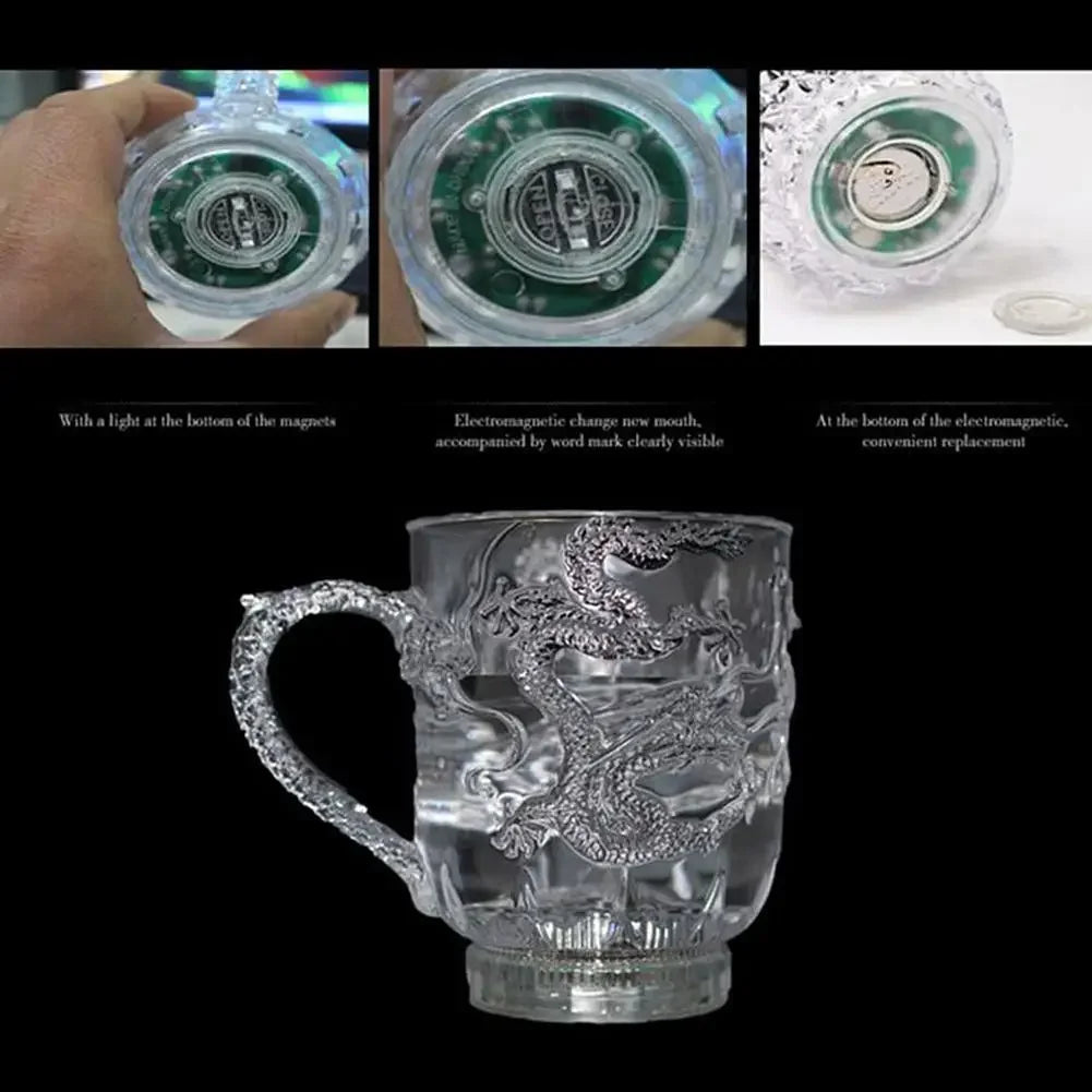 A clear glass mug featuring an intricately carved dragon design, shown alongside light-up components.