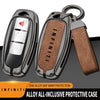 A black zinc alloy protective case cover for an Infiniti key, showing the interior and a textured grip sleeve.