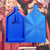 A bright blue large diamond painting tray with a pop-up plug for bead sorting placed on a colorful fabric background.