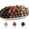 A collection of round silicone beads in various shades including oatmeal, camel, and chocolate.