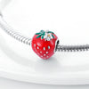 A red strawberry charm bead made of 925 sterling silver with a zircon detail, displayed on a white surface.