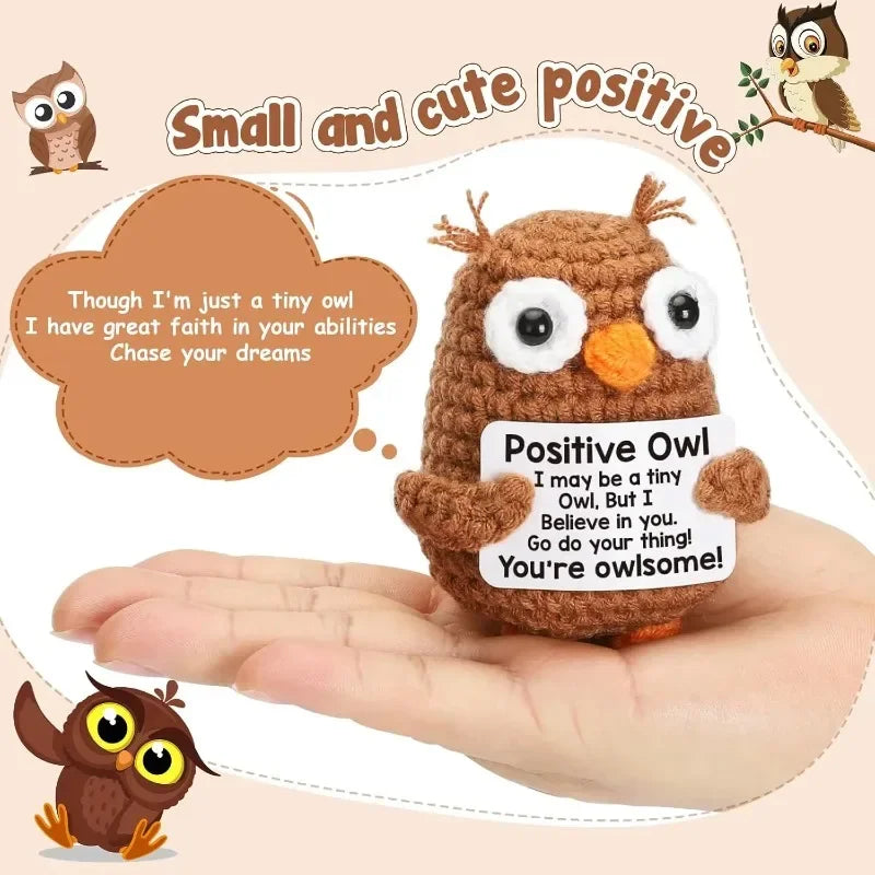A handmade crochet owl with large eyes sits in an open palm, surrounded by inspirational text.