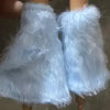 A doll fashion set featuring fluffy light blue faux fur clothing.