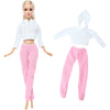 A fashion doll outfit set featuring a white cropped hoodie and pink sweatpants.