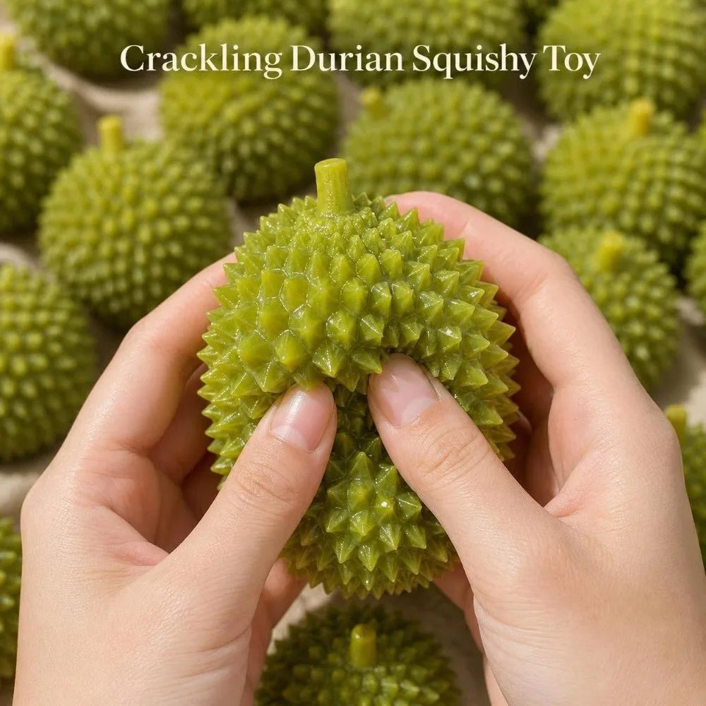 Hands holding a green durian squishy toy with a crackling texture