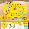 A yellow board game set featuring a bumblebee theme with various colored balls and bee figures for two players.