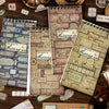 A collection of vintage label stickers and paper scraps for scrapbooking and journaling displayed on a wooden surface.