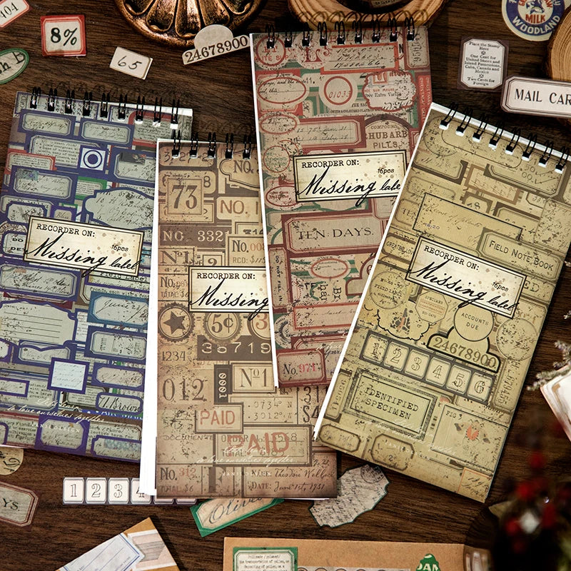 A collection of vintage label stickers and paper scraps for scrapbooking and journaling displayed on a wooden surface.