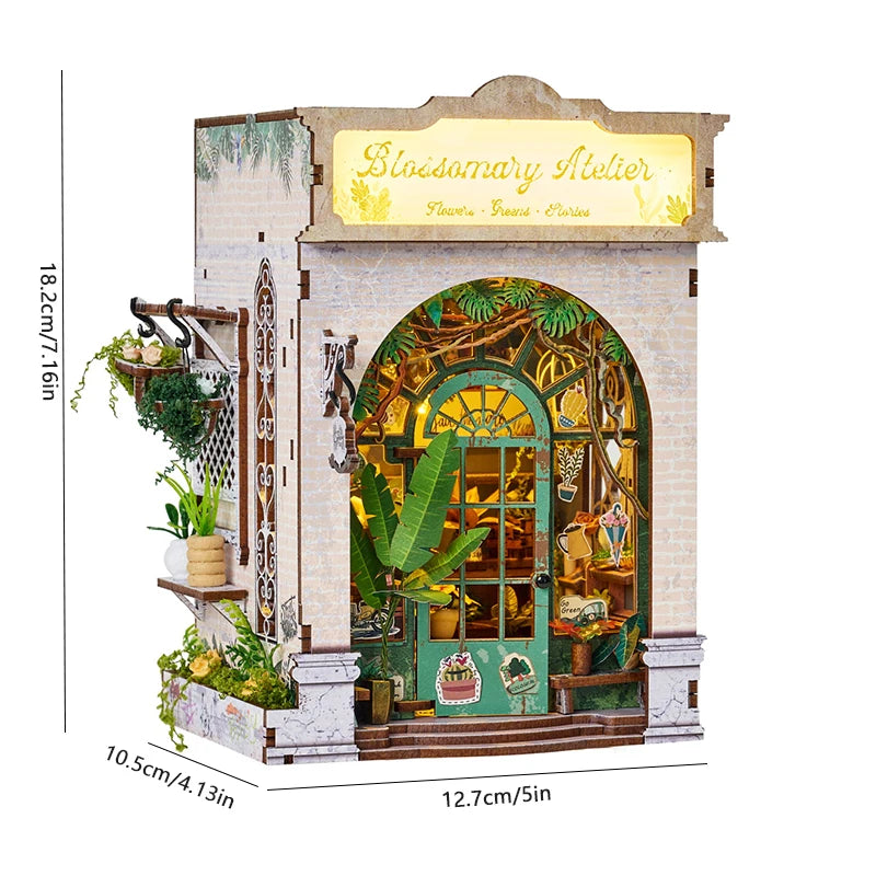 A miniature wooden dollhouse kit featuring a brick facade, arched window, and decorative greenery.