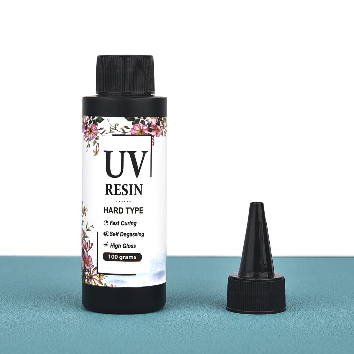 A black bottle of UV Resin used for hard type jewelry making and crafts.