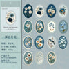 A sheet of vintage floral stickers featuring blue, white, and green flowers for scrapbooking and journaling.