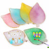 A set of luxury resin nail art palettes featuring various pastel and iridescent colors with gold trim.