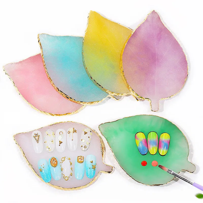 A set of luxury resin nail art palettes featuring various pastel and iridescent colors with gold trim.