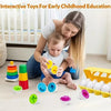 A woman is interacting with a baby and various colorful shape sorting puzzles for early childhood education.