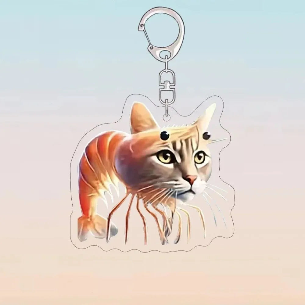 A stylized orange tabby cat head design on an acrylic keychain with a metal loop.