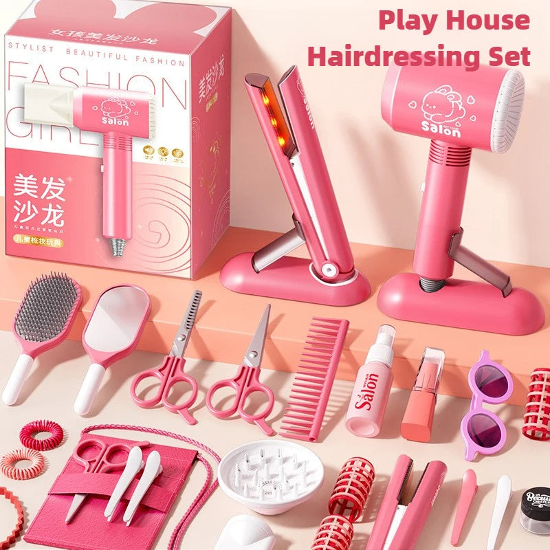 A pink play house hairdressing set featuring various styling tools like blow dryers, scissors, combs, and brushes.