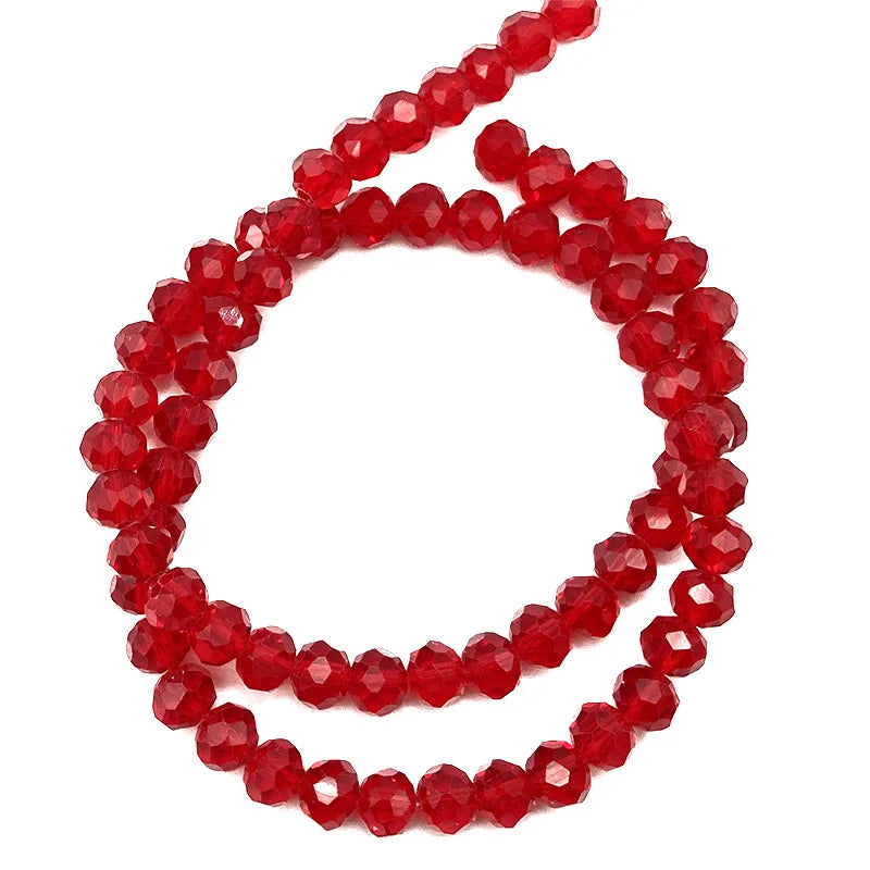 A strand of red Austrian faceted crystal beads used for jewelry making