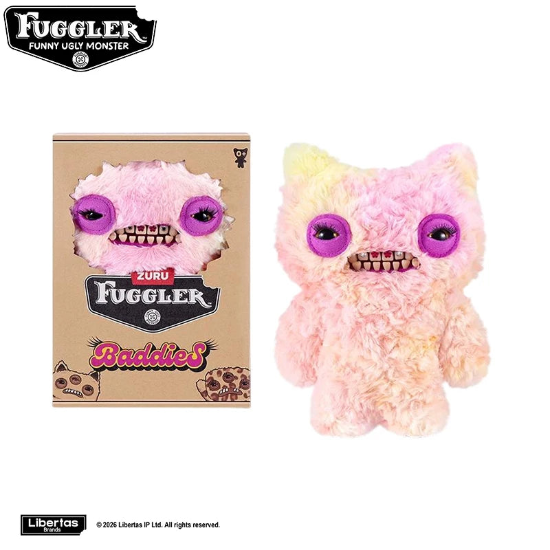 A pink Fuggler Baddies plush toy with purple eyes and teeth, packaged in a cardboard box.