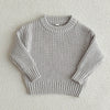 A light gray knit baby pullover sweater with a ribbed neckline and long sleeves.